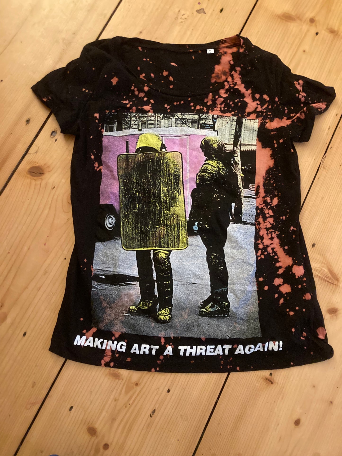 MAKING ART A THREAT AGAIN SHIRT